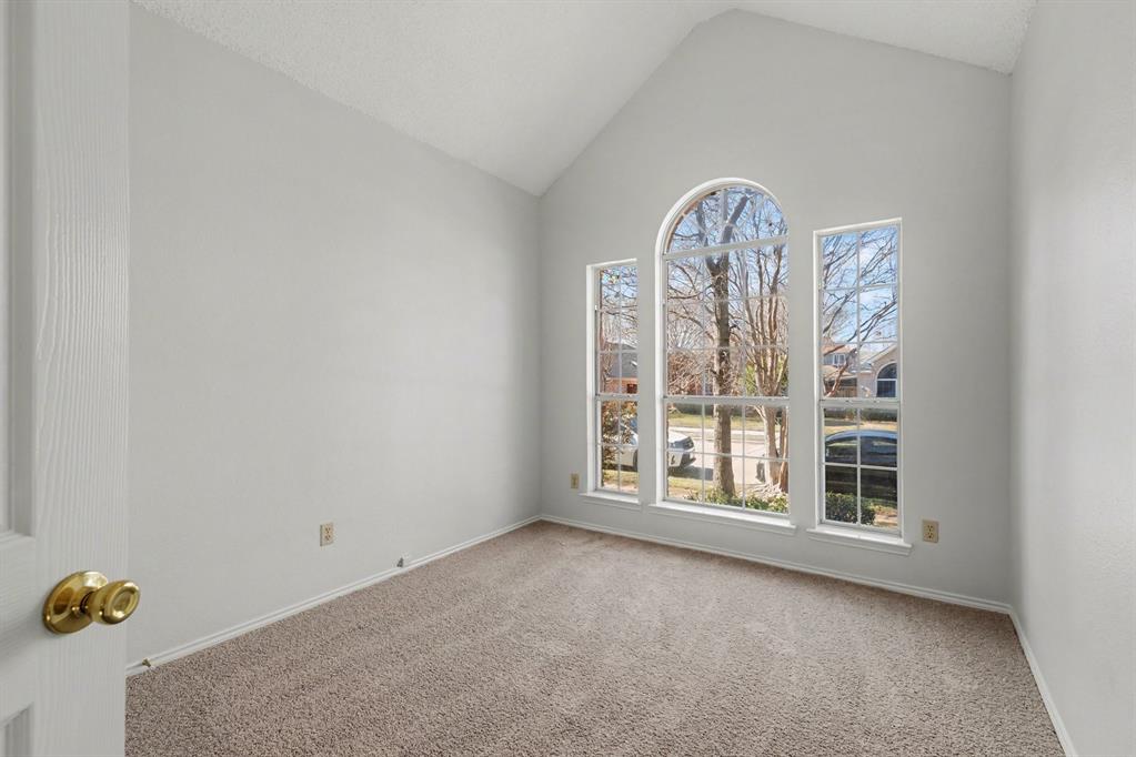6921 Hominy Ridge Rowlett, TX 75089 - Photo 19 of 27 a view of an empty room with a window