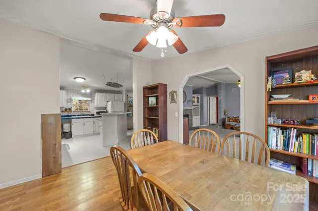 a kitchen with cabinets stainless steel appliances and a sink