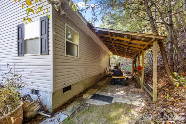 a flower garden in front of a house