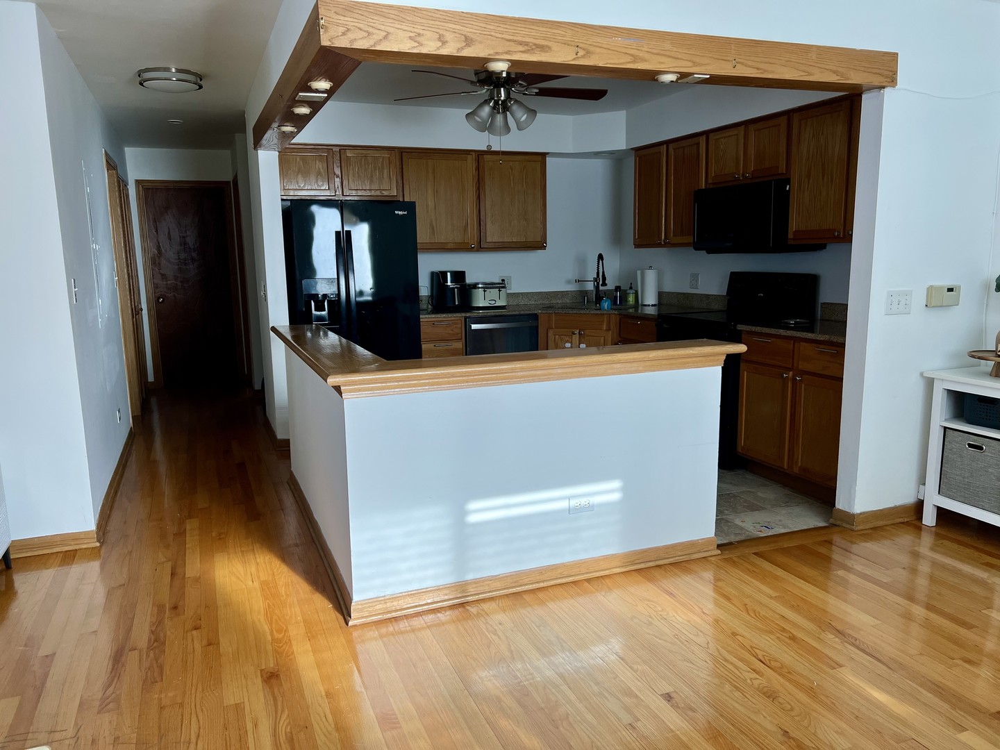 1108 Castilian Court, Unit 126 Glenview, IL 60025 - Photo 4 of 7 a kitchen with stainless steel appliances granite countertop a stove top oven a sink and a refrigerator