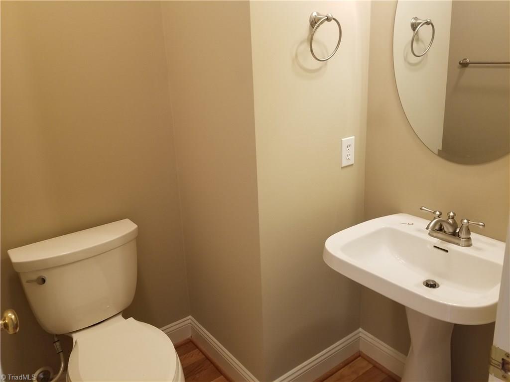 110 Mt Sorrel Road King, NC 27021 - Photo 11 of 30 Freshly painted guest half bath on main level.