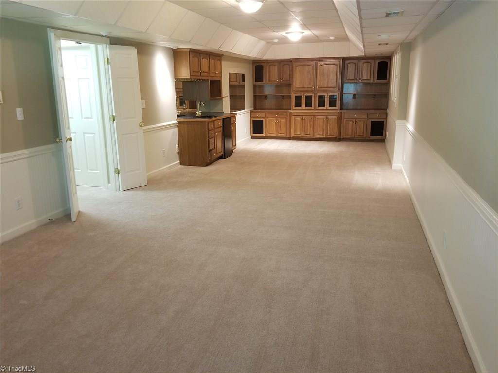 110 Mt Sorrel Road King, NC 27021 - Photo 21 of 30 This enormous room is Den, with wet bar, entertainment center, playroom or whatever you desire.