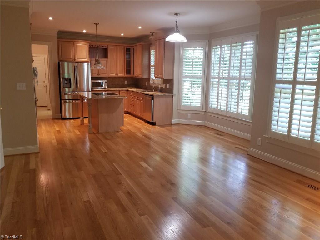 110 Mt Sorrel Road King, NC 27021 - Photo 6 of 30 Beautiful, efficient kitchen, island with bar, breakfast room and keeping room, open to screened porch.