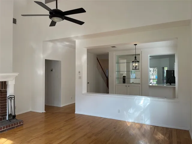wooden floor in a hall with an entryway