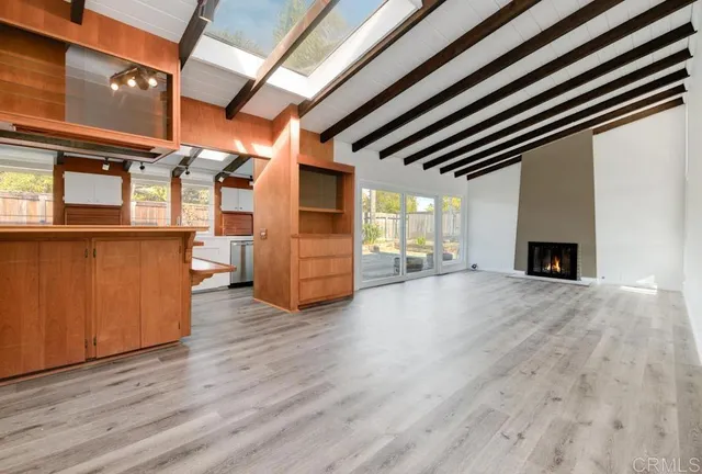 a view of livingroom with furniture and fireplace