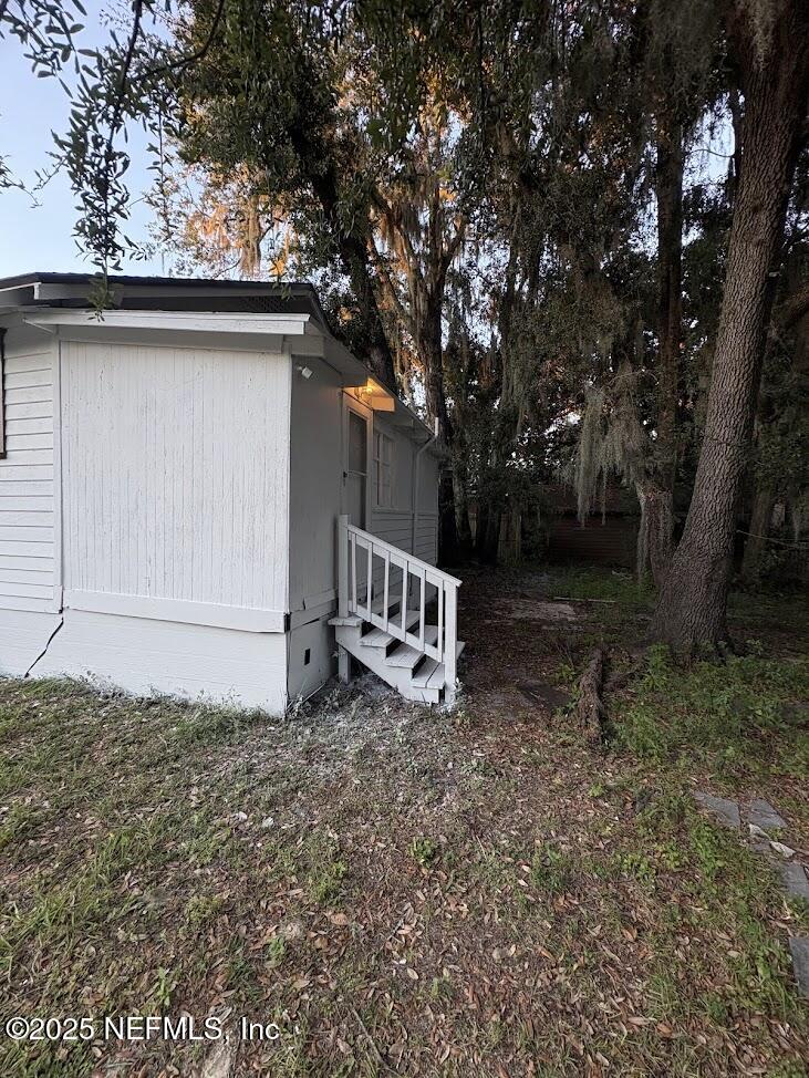 4205 Perry Street Jacksonville, FL 32206 - Photo 4 of 5 a view of a house with a yard