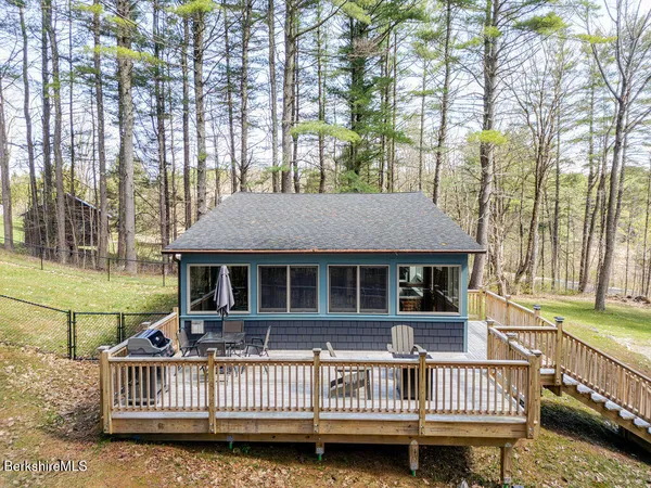 a view of a house with a roof deck