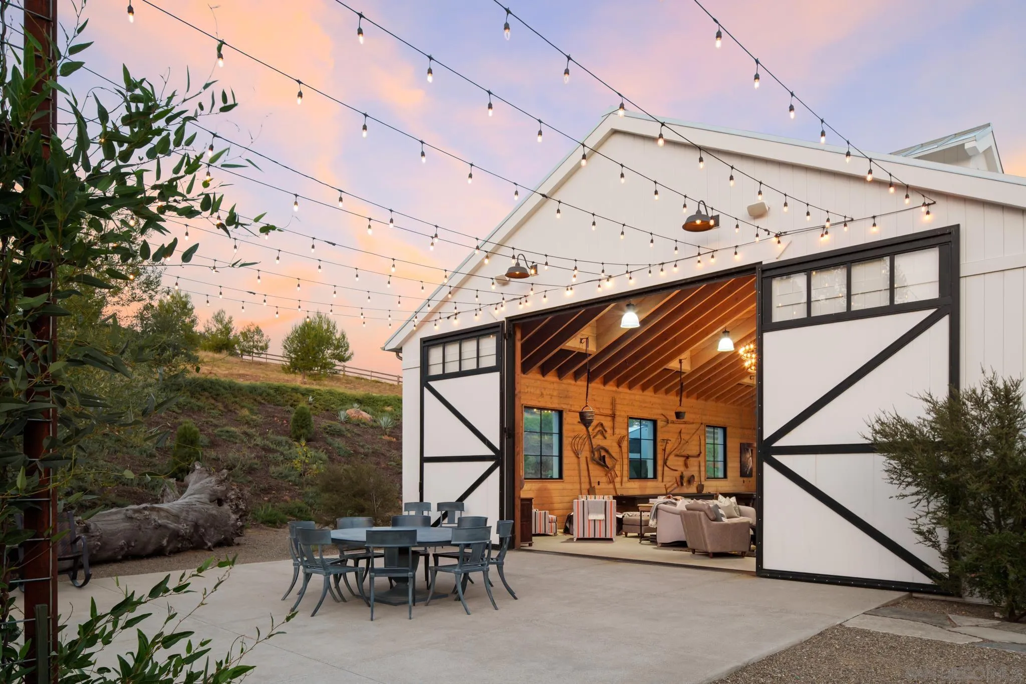 26904 Mesa Grande Road Santa Ysabel, CA 92070 - Photo 17 of 72 a view of a porch with furniture and a potted plant