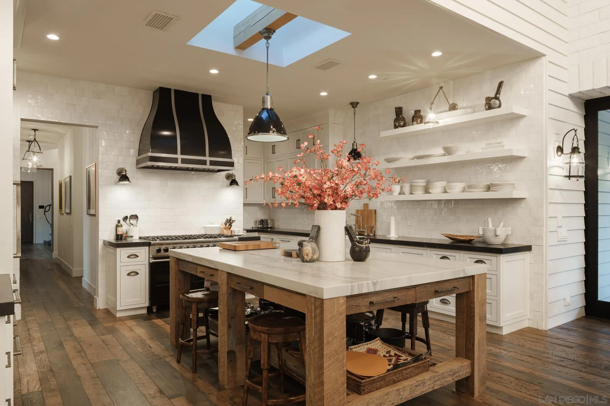 26904 Mesa Grande Road Santa Ysabel, CA 92070 - Photo 34 of 72 a kitchen with a stove a sink and a refrigerator