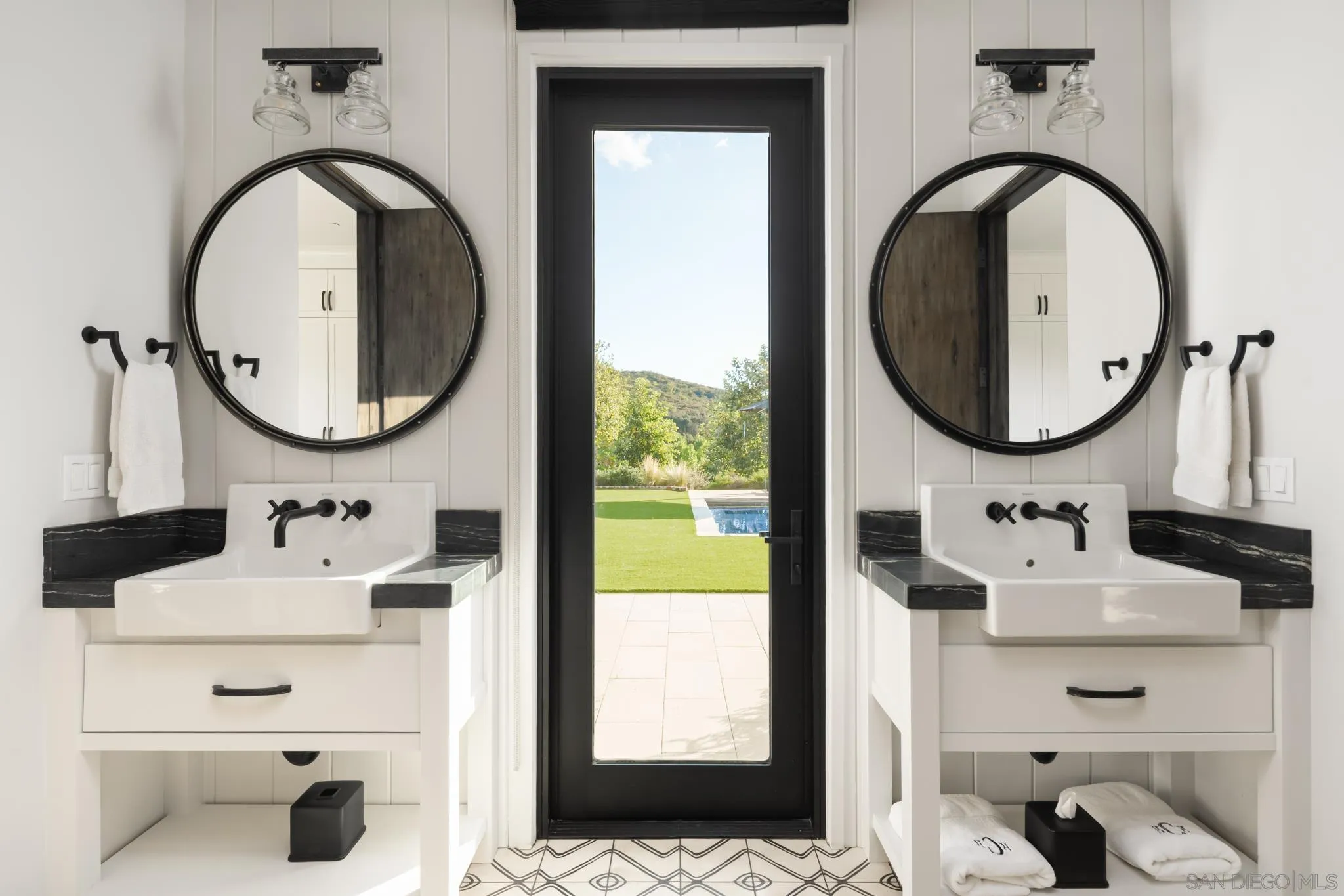 26904 Mesa Grande Road Santa Ysabel, CA 92070 - Photo 54 of 72 a bathroom with a sink and a mirror