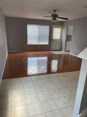 a view of an empty room and window