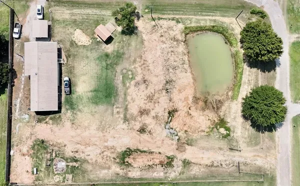 a bathroom with a shower and a mirror