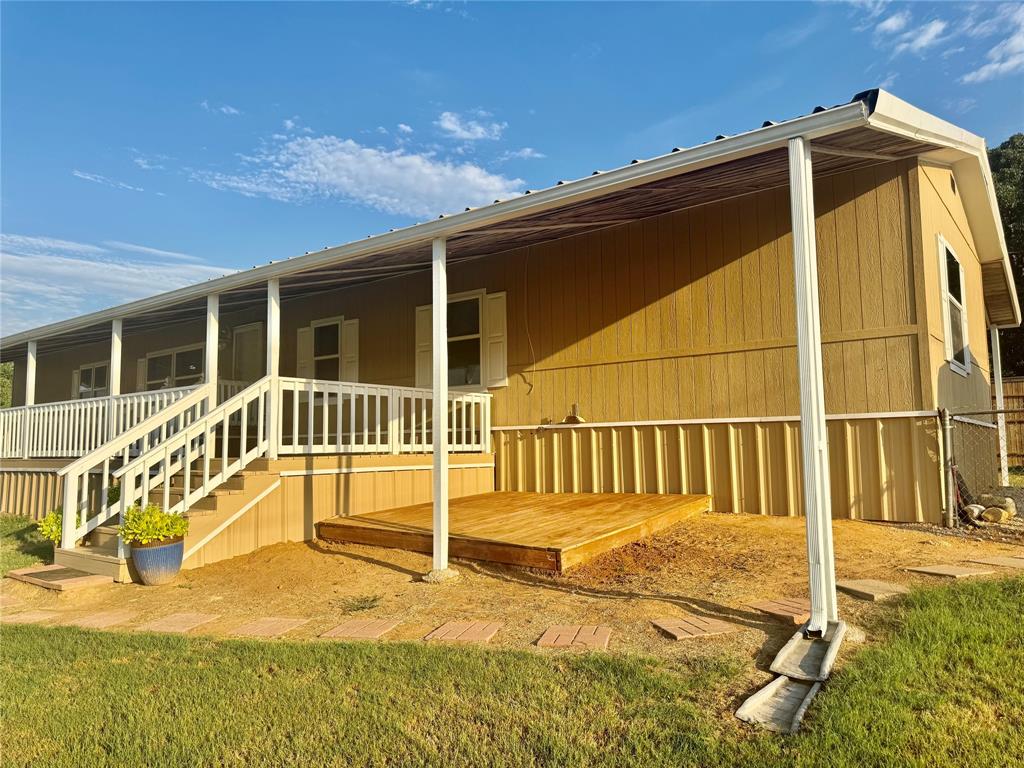 934 Tiffany Street Azle, TX 76020 - Photo 18 of 25 a view of a house with a outdoor space