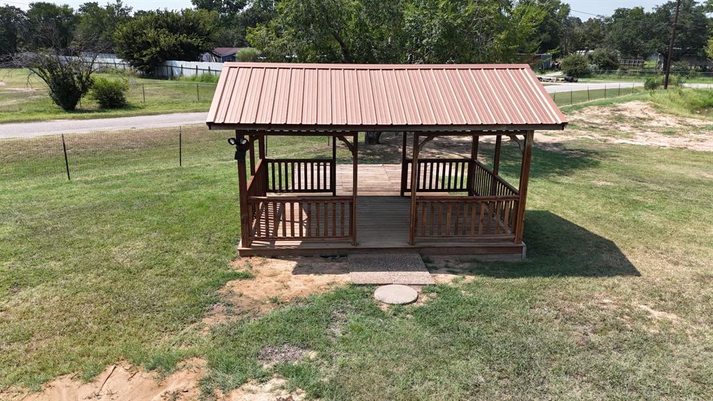934 Tiffany Street Azle, TX 76020 - Photo 20 of 25 a view of swimming pool and deck in the backyard