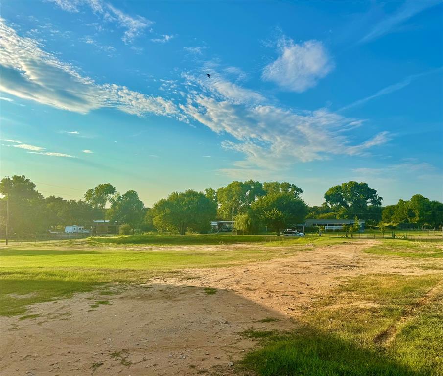 934 Tiffany Street Azle, TX 76020 - Photo 21 of 25 a view of an ocean and a mountain