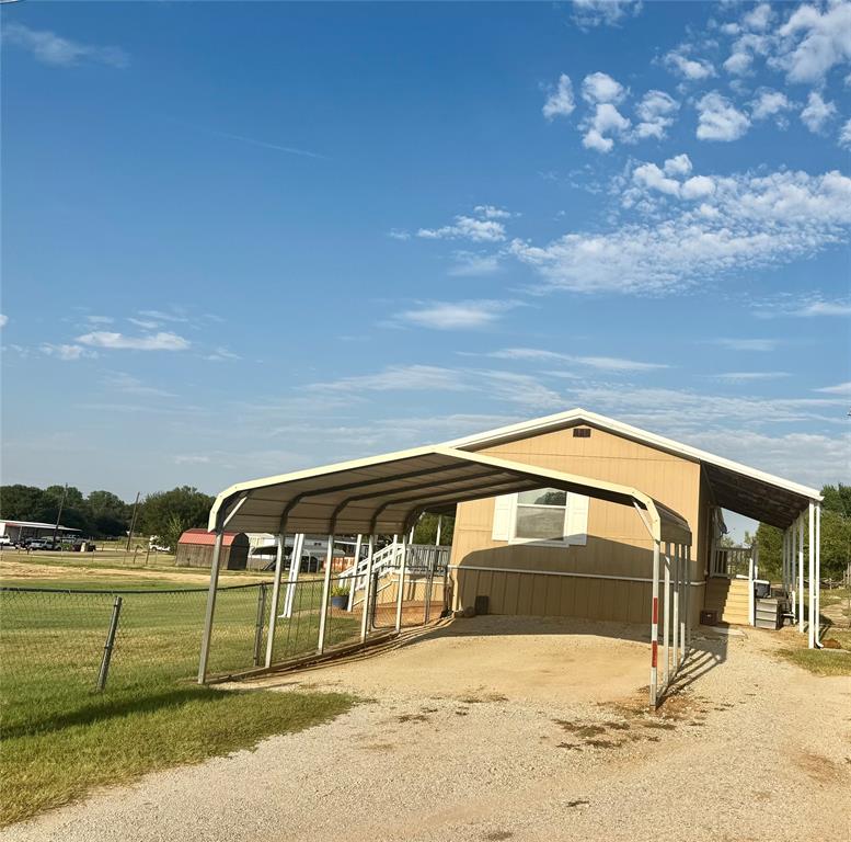 934 Tiffany Street Azle, TX 76020 - Photo 24 of 25 a view of backyard with swimming pool