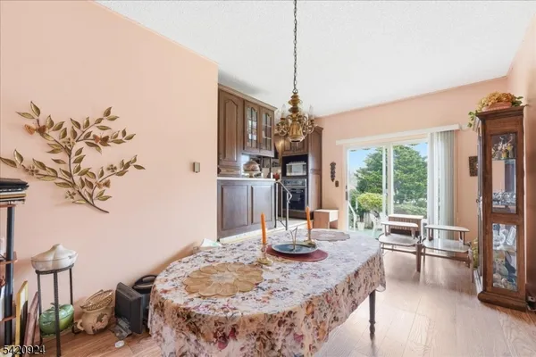 a dining room with a table or chairs and a wooden floor