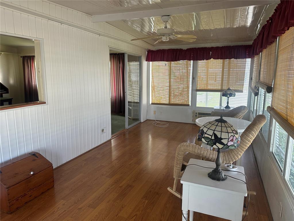 5791 Orange Blossom Road Venice, FL 34293 - Photo 5 of 24 a living room with furniture and a large window