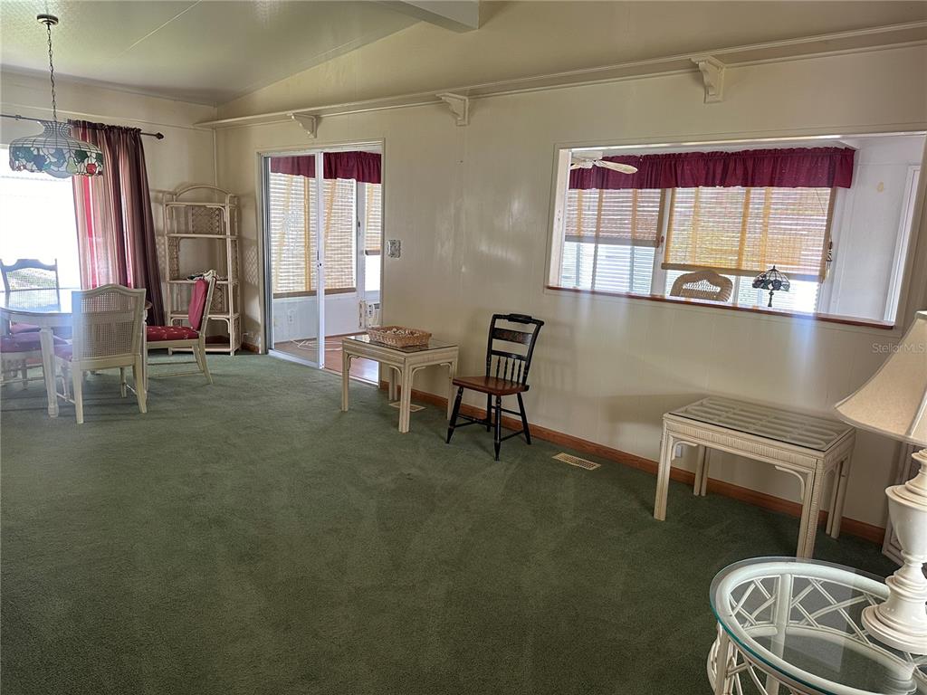 5791 Orange Blossom Road Venice, FL 34293 - Photo 6 of 24 a living room with furniture and a window