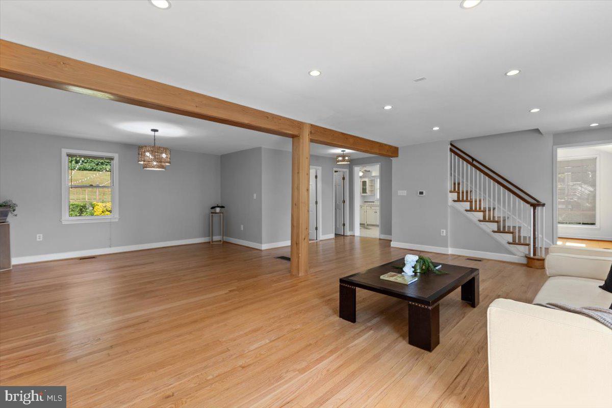 6023 Walhonding Road Bethesda, MD 20816 - Photo 6 of 37 a living room with furniture and wooden floor