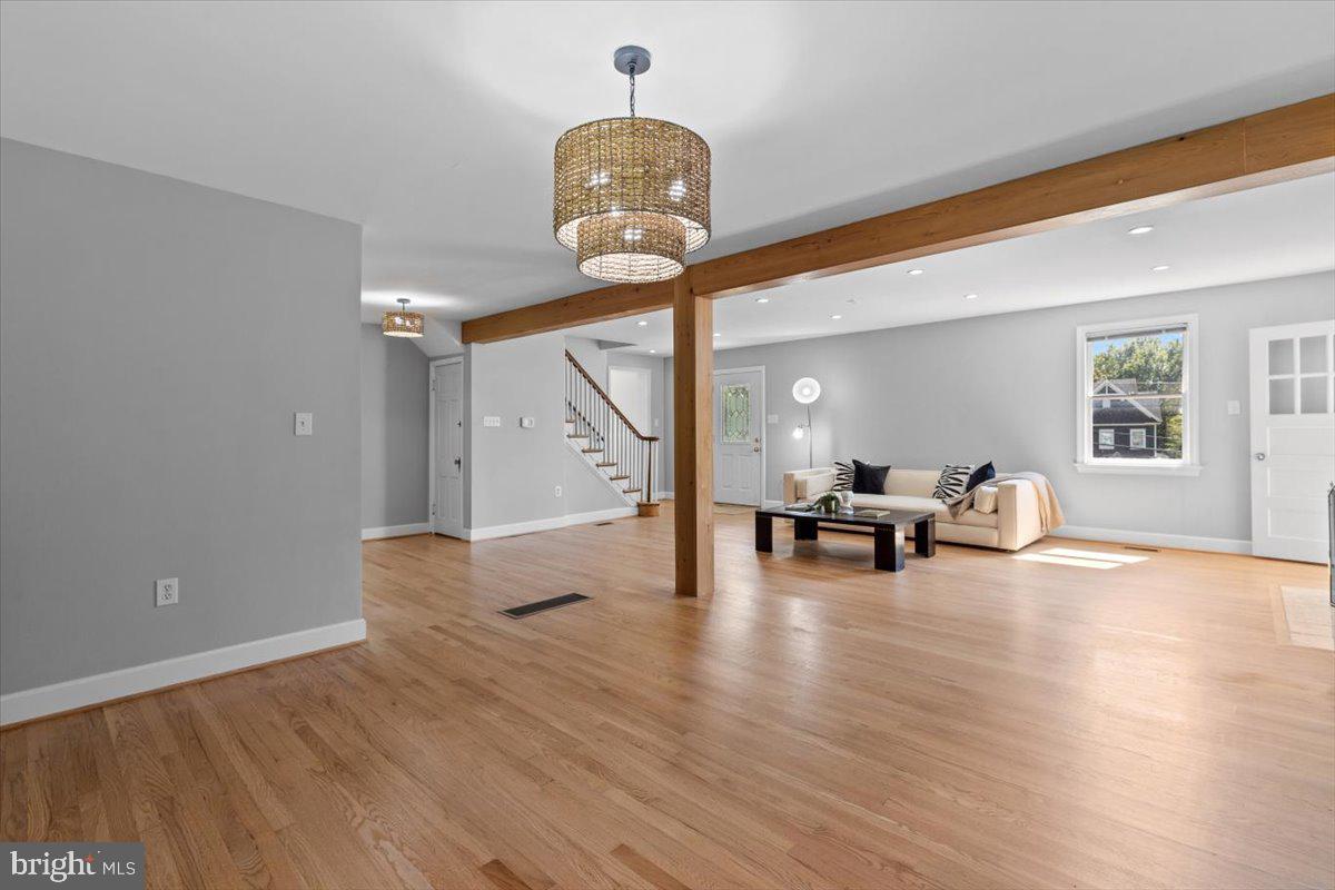 6023 Walhonding Road Bethesda, MD 20816 - Photo 8 of 37 a view of living room with furniture and wooden floor