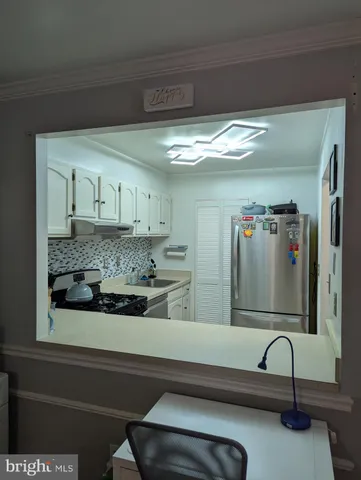 a bathroom with a sink and mirror