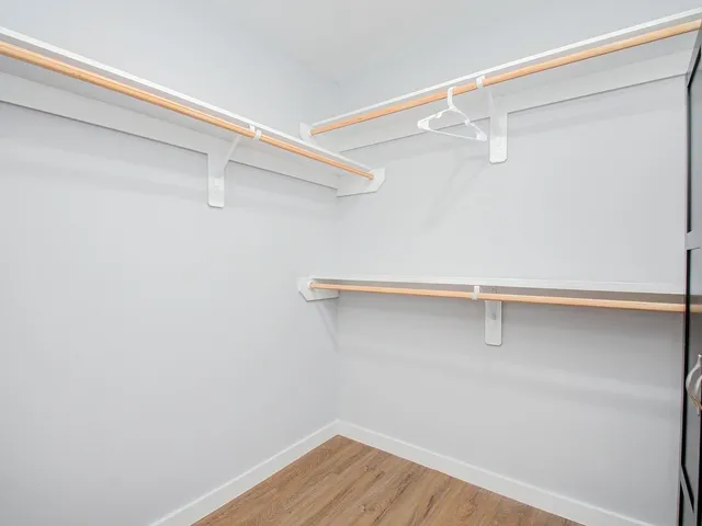 a view of a room with racks on the wall