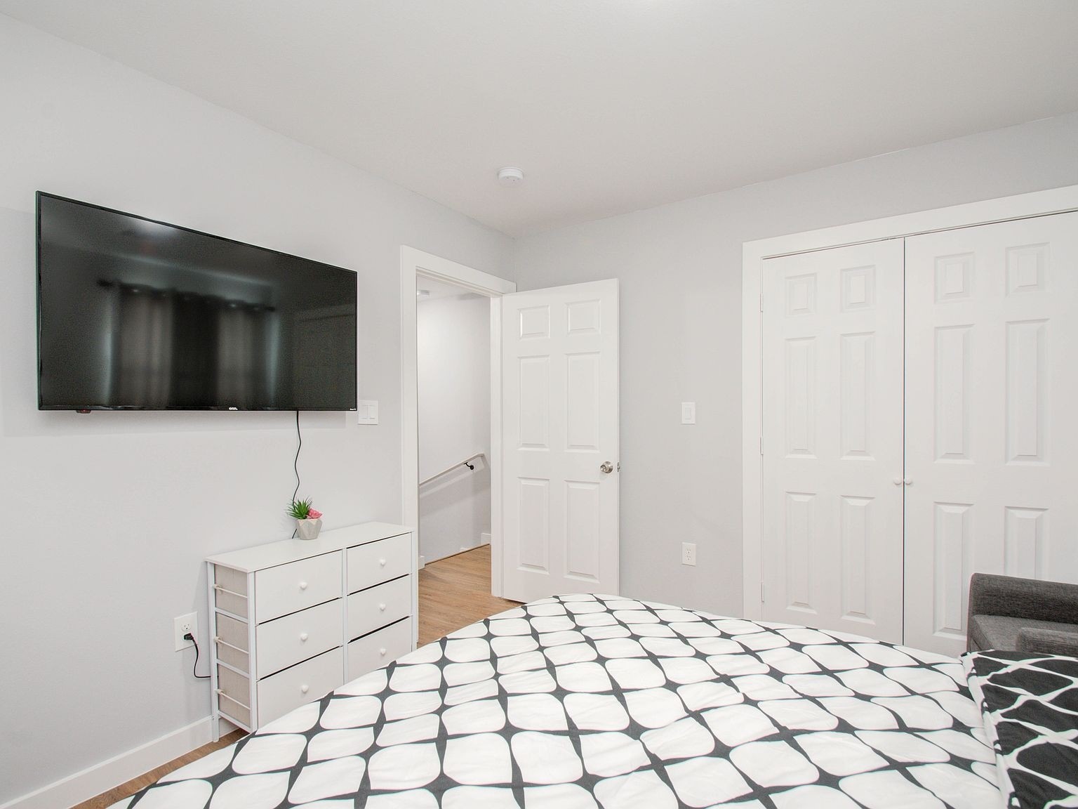 6610 Haight Street, Unit A Houston, TX 77028 - Photo 20 of 31 a bedroom with a bed and a chair