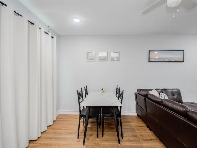 a view of a dining room with furniture