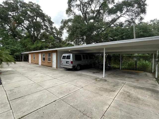 a view of house with outdoor space and porch
