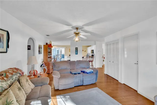 a bedroom with a bed and a dresser in it