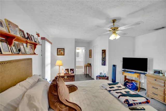 a bedroom with furniture and a couch