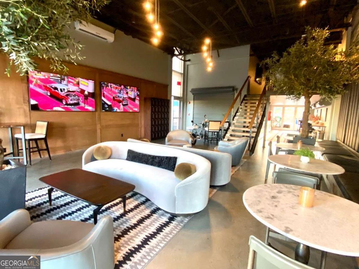 702 Joe Lane Cox Road, Unit 101 Dawsonville, GA 30534 - Photo 19 of 28 a living room with furniture and a pool table