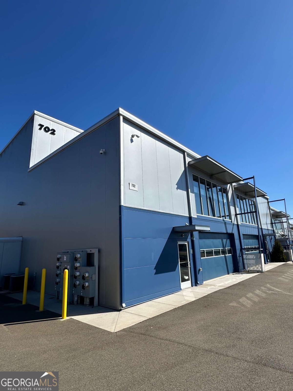 702 Joe Lane Cox Road, Unit 101 Dawsonville, GA 30534 - Photo 2 of 28 a view of a balcony