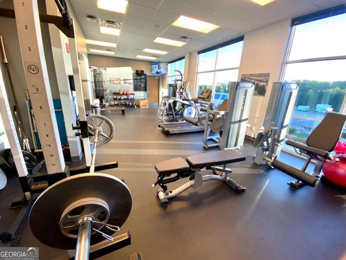 702 Joe Lane Cox Road, Unit 101 Dawsonville, GA 30534 - Photo 21 of 28 a view of a room with gym equipment