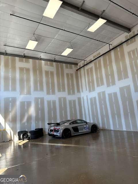 702 Joe Lane Cox Road, Unit 101 Dawsonville, GA 30534 - Photo 3 of 28 a view of a room with gym equipment