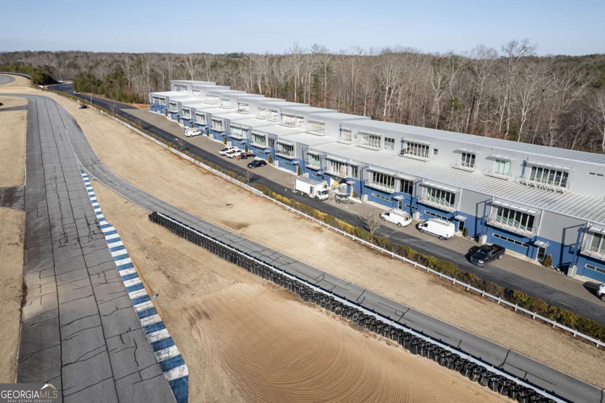 702 Joe Lane Cox Road, Unit 101 Dawsonville, GA 30534 - Photo 7 of 28 a view of a large building