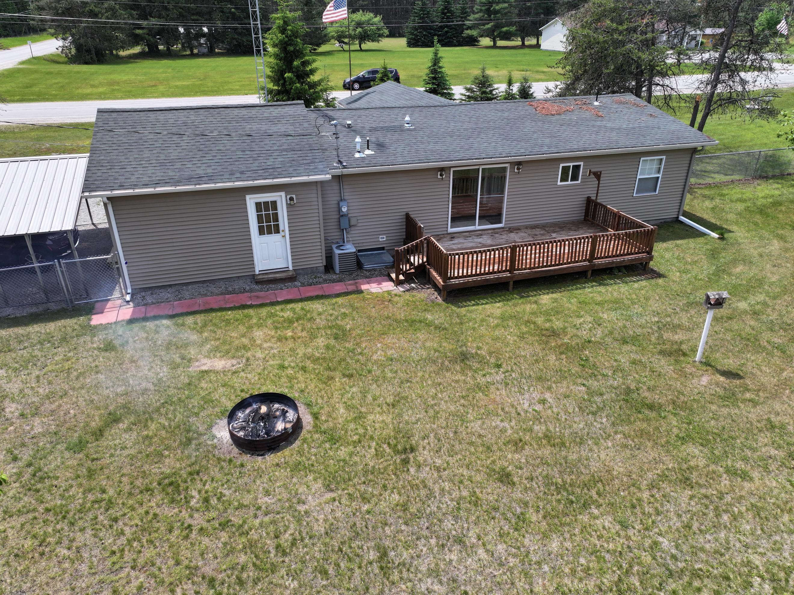 11990 Lake 15 Road Atlanta, MI 49709 - Photo 32 of 33 Fenced in Yard