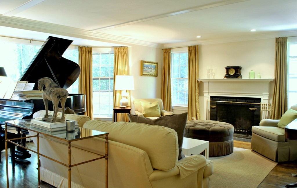 63 Todd Pond Road Lincoln, MA 01773 - Photo 1 of 18 a living room with furniture a fireplace and a large window