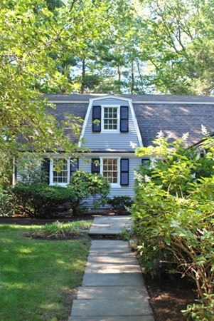 63 Todd Pond Road Lincoln, MA 01773 - Photo 18 of 18 a front view of a house with a yard