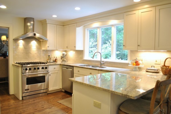 63 Todd Pond Road Lincoln, MA 01773 - Photo 4 of 18 a kitchen with a stove a sink and a refrigerator