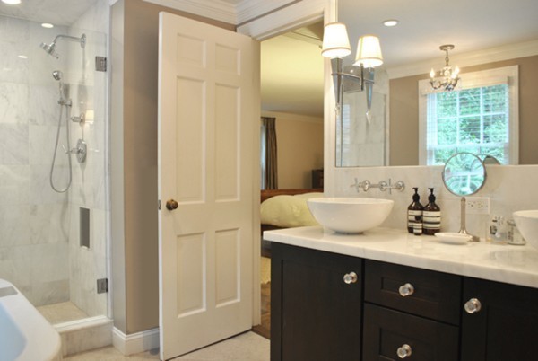 63 Todd Pond Road Lincoln, MA 01773 - Photo 9 of 18 a bathroom with a double vanity sink mirror and shower