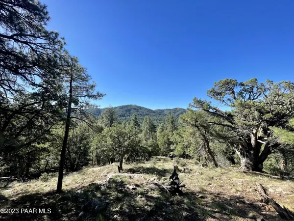 a picture of white wall with a white roof