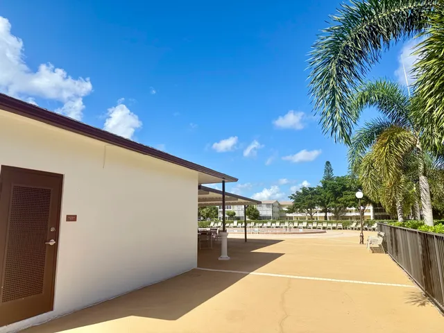 a view of a patio with swimming pool