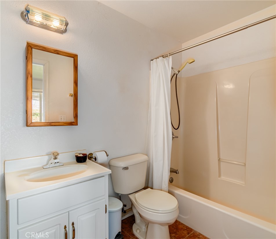 11575 Loch Lomond Road Middletown, CA 95461 - Photo 14 of 38 a bathroom with a sink toilet and shower