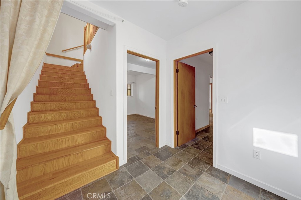 11575 Loch Lomond Road Middletown, CA 95461 - Photo 18 of 38 a view of entryway and hall with wooden floor