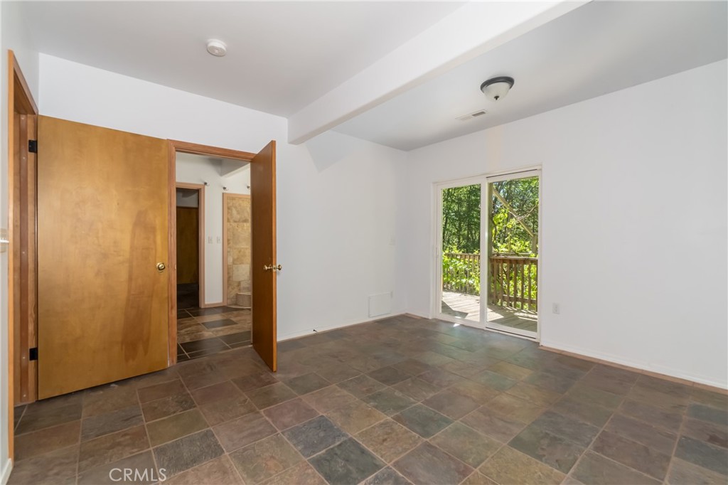 11575 Loch Lomond Road Middletown, CA 95461 - Photo 25 of 38 a view of an empty room with a window