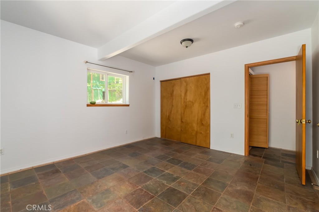 11575 Loch Lomond Road Middletown, CA 95461 - Photo 26 of 38 a view of an empty room with a window