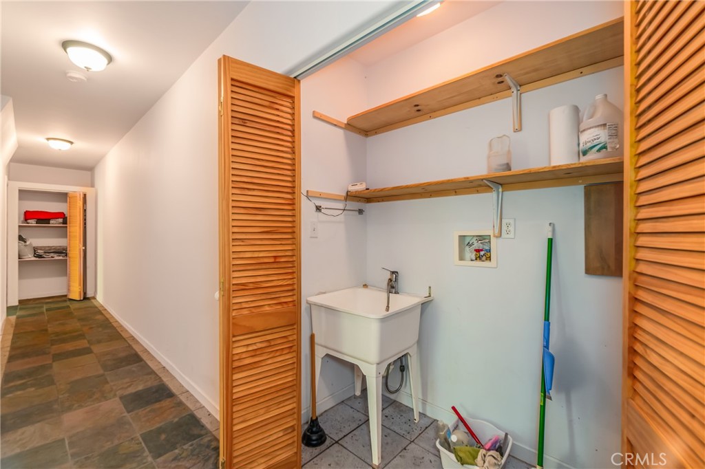 11575 Loch Lomond Road Middletown, CA 95461 - Photo 27 of 38 a bathroom with a sink and a mirror