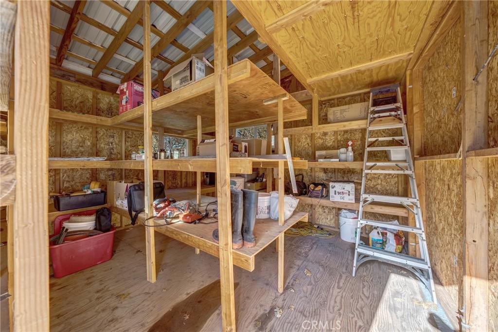 11575 Loch Lomond Road Middletown, CA 95461 - Photo 33 of 38 a view of walk in closet with clothes and shoes